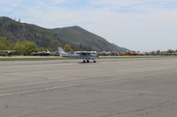 N704JH @ SZP - 1976 Cessna 150M, Continental O-200 100 Hp, taxi off the active - by Doug Robertson