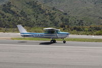 N704JH @ SZP - 1976 Cessna 150M, Continental O-200 100 Hp, landing roll Rwy 22 - by Doug Robertson
