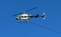 N988B @ KRDD - N988B returning to Redding CA after fire bucket training - by Tom Vance
