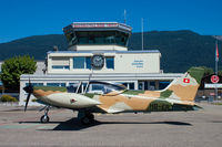 HB-ERJ @ LSZG - In front of the tower at Grenchen.