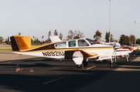 N8921U @ KRHV - 1965 Beechcraft S35 regular visitor on the ramp at Reid Hilview Airport, San Jose, CA. - by Chris Leipelt