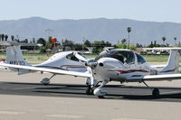 N519TM @ KRHV - Locally-based 2007 Diamond Star DA40 on the ramp with another local DA-40 at Reid Hilview Airport, San Jose, CA. - by Chris Leipelt