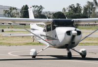 N5290E @ KRHV - Locally-based 2002 Cessna 172S taxing to the ramp at Reid Hillview Airport, San Jose, CA. - by Chris Leipelt