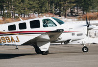 N999AJ @ KTVL - 1984 Beechcraft B36TC Bonanza taxing out for departure at South Lake Tahoe Airport, CA. - by Chris Leipelt