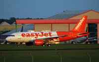 G-EZBF @ EGSH - Departing in the evening sunset following paint work with Air Livery, formerly wore Tartan on the rear section - by AirbusA320
