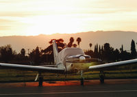 N1582X @ KRHV - Locally-based 1975 Piper PA-28R-200 parked at its tie down as the sun sets over Reid Hillview Airport, San Jose, CA. - by Chris Leipelt