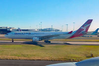 VH-QPJ @ YSSY - Mardi Gras jet - by Micha Lueck