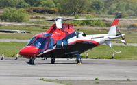G-EMHE @ EGFH - Visiting A-109 Grand operated by East Midlands Helicopters. - by Roger Winser