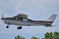 N9535Y @ KBOI - Climb out from RWY 10L. Not sure what is attached under the rudder.