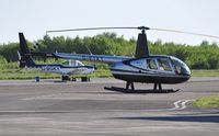 G-ETKT @ EGFH - Visiting R44 helicopter. - by Roger Winser