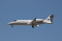 N61WF @ KIND - Learjet 60