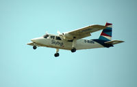 G-BUBN @ EGHE - G-BUBN Islander, Isles of Scilly Skybus in the latest colourscheme arriving in Scilly. - by Pete Hughes