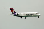 N485HA @ HNL - N485HA Boeing 717 short finals for Honolulu - by Pete Hughes