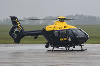 G-POLG @ EGSH - Parked at Norwich in heavy rain. - by Graham Reeve