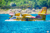 I-DPCO - A Canadair, in anti-fire service, fills the water tanks in Campotosto Lake (Abruzzi - Italy). - by Beniamino Trombetta