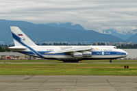 RA-82077 @ CYVR - @ YVR to load two Sikorsky S-61N's you see in the shots. - by Guy Pambrun