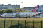 7O-ADM @ EIDW - Parked prior to delivery (apologies for the fence) - by Robert Kearney