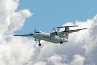 C-FADF @ CYVR - Landing on 26R - by Guy Pambrun