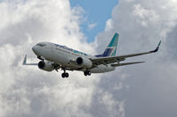 C-FIWJ @ CYVR - Landing on 26R - by Guy Pambrun