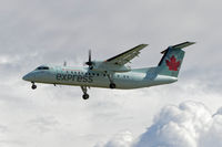 C-GTAG @ CYVR - Landing on 26R - by Guy Pambrun