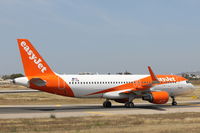 OE-IVW @ LMML - A320 OE-IVW Easyjet - by Raymond Zammit