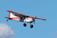 C-FKOE @ CYXX - Landing - by Guy Pambrun