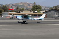N704JH @ SZP - 1976 Cessna 150, Continental O-200 100 Hp, landing roll Rwy 22. Note new added third windsock and location. - by Doug Robertson