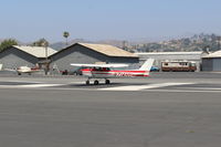 N714HH @ SZP - 1977 Cessna 150M, Continental O-200 100 Hp, landing roll Rwy 22 - by Doug Robertson