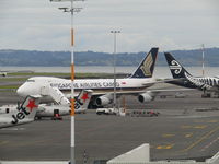 9V-SFQ @ NZAA - on stand at AKL - preparing to leave - by magnaman