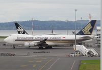 9V-SFQ @ NZAA - taxying out back to Sing - by magnaman