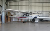 ZK-EEN @ NZTH - In flying club hangar at Thames - by magnaman