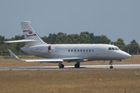 HB-IGU @ EGJB - Taxiing in through the heat haze after arrival - by alanh