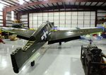 N692CK @ KISM - Curtiss P-40N Warhawk undergoing maintenance/restoration at the Kissimmee Air Museum, Orlando FL - by Ingo Warnecke