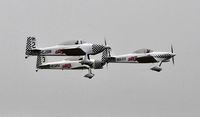 G-CJSM @ EGFH - Ravens 2 and 3 led by Raven 1 departing Runway 04 to display on a wet day 2 at WNAS18.
Ravens 4 and 5 are out of shot. - by Roger Winser