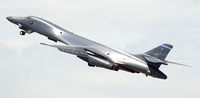 85-0073 @ KDYS - Dark Knight with some vortices on takeoff - by John Hodges