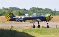 G-OUGH @ EGFH - Resident Yak-52 in revised markings of DOSAAF/Yellow 19 as carried when the aircraft entered service in Russia circa 1987. - by Roger Winser
