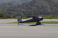 N1140B @ SZP - 1947 Luscombe 8A, Continental A&C65 65 Hp, landing roll Rwy 22. This aircraft has been fully painted over the original shiny aluminum original factory construction. - by Doug Robertson