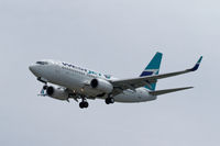 C-FMWJ @ CYXX - Landing on 26R - by Guy Pambrun