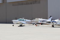 N3856B @ CMA - 1955 Beech F35 BONANZA, Continental E-225-8 225 Hp, original cost $19,990 in the Fabulous Fifties. Third side window added in the F model. - by Doug Robertson