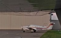 N8325C @ KDVN - Sitting on the Carver Aero Ramp - by Floyd Taber