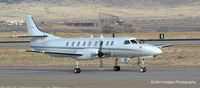 92-0373 @ KABQ - C-26B going out on a mission - by John Hodges
