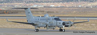 10-0646 @ KABQ - MC-12 Taxiing for takeoff at KABQ - by John Hodges