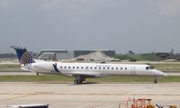 N14117 @ KORD - EMB-145XR - by Mark Pasqualino