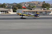 N422DM @ SZP - 2003 Wilder PANZL S-330, Lycoming IO-540, Experimental class, landing roll Rwy 22. Panned shot of this speedster. - by Doug Robertson