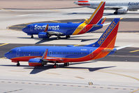 N550WN @ KPHX - N434WN is in the background. - by Dave Turpie