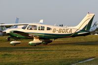 G-BOKA @ EGTF - Previously N2860S. Taxiing in after landing in the late evening sunshine. - by Glyn Charles Jones