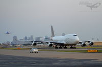 N322SG @ KDAL - Moving the FC Barcelona team from Los Angeles to Dallas. The queen is seen on the taxiway with the Dallas Skyline displaying itself proudly in the rear.