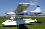 N4869C @ KLAL - Cessna A185F Skywagon on amphibious floats at 2018 Sun 'n Fun, Lakeland FL