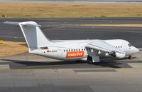 D-AZFR @ EDDL - Easyjet (WDL) BAe146 taxying for departure to TXL. Still wearing the former Cello colors. - by FerryPNL
