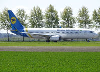 UR-UIC @ EHAM - Taxi to runway 36L of Schiphol Airport - by Willem Göebel